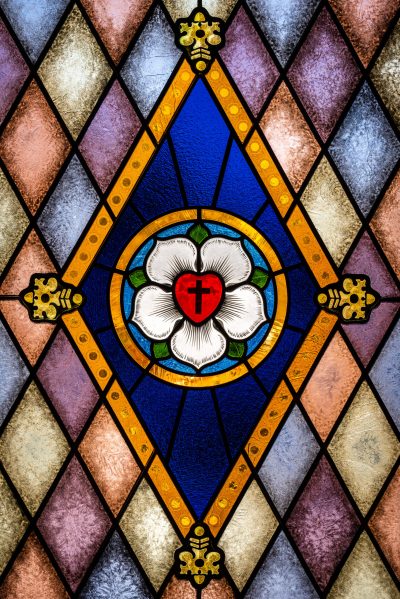 Stained glass depicting the Luther seal on Wednesday, Oct. 27, 2021, at Immanuel Lutheran Church, Seymour, Ind. LCMS Communications/Erik M. Lunsford